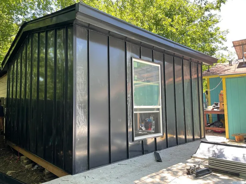 Black standing seam metal wall panels for Metal Roof Installation in Woodland Park