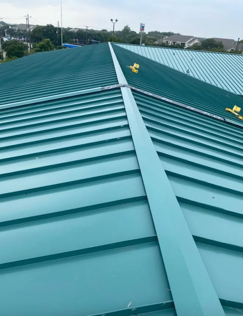 Green commercial metal roof ridge and valley for Metal Roof Repair in Woodland Park