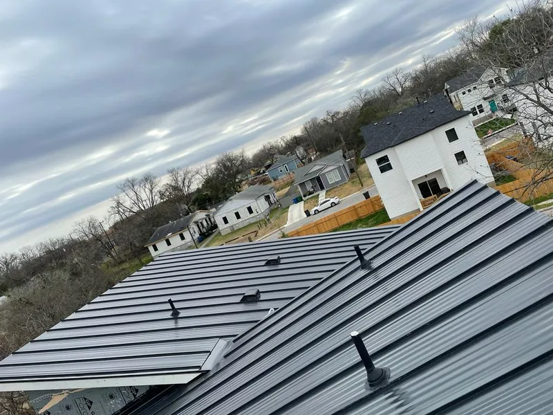 Standing seam metal roof panels with vents for Skylight Repair in Woodland Park